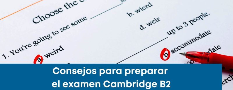 Estudiante practicando para el examen Cambridge B2 en una academia, con apuntes y material de estudio en inglés.